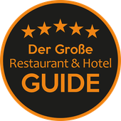 Rundes Siegel mit fünf Sternen und dem Text Der Große Restaurant und Hotel Guide.